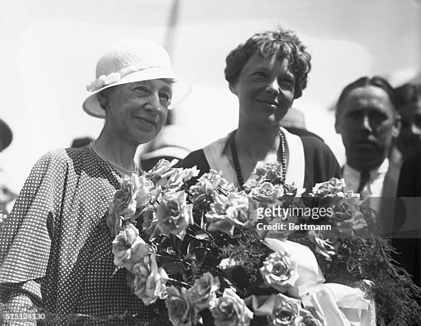 Mrs. Amy Earhart, seen here with her famous aviatrix daughter, Amelia Earhart Putnam, at the Boston Airport.