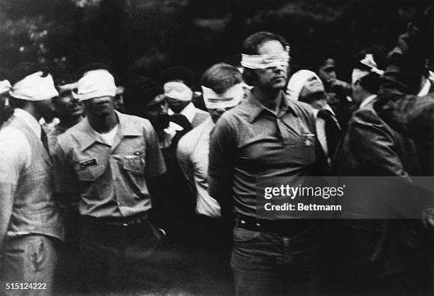 Photo shows Hostages photographed inside the United States embassy compound as they are led outside the building, blindfolded on the first day of the...