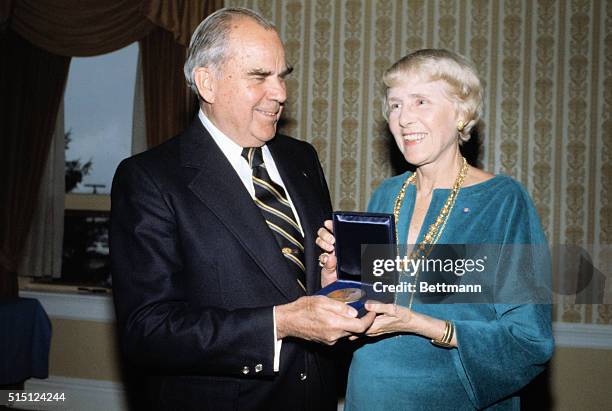 Brig. Gen. Luke W. Finlay of West Point presents Clare Boothe Luce with the Thayer Award, an award given to civilians whose services, accomplishments...