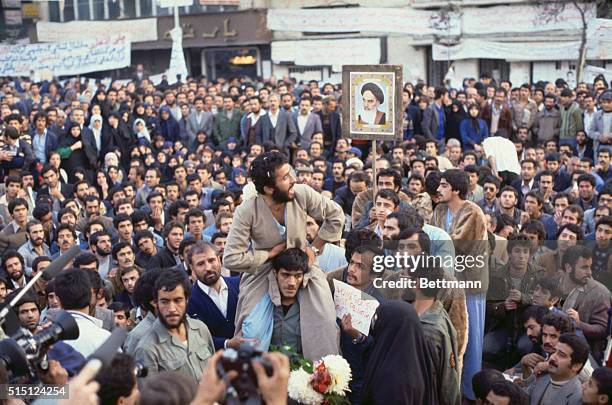 Crowds of Iranian demonstrators gather together at the United States Embassy to demonstrate their views.
