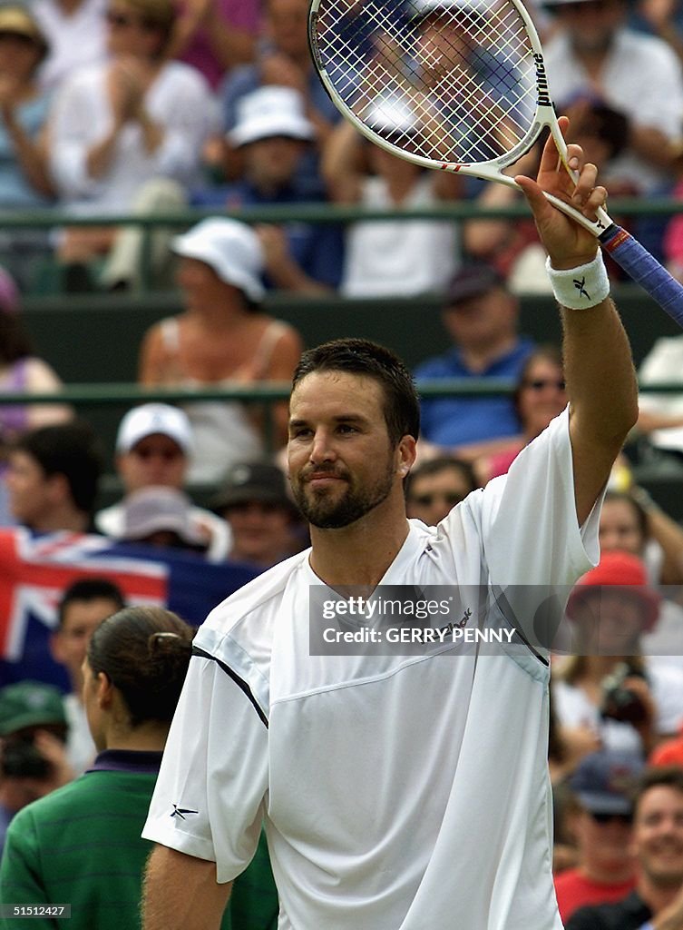 Patrick Rafter Arms Australian Patrick Rafter celebrates after his quarter final match ...