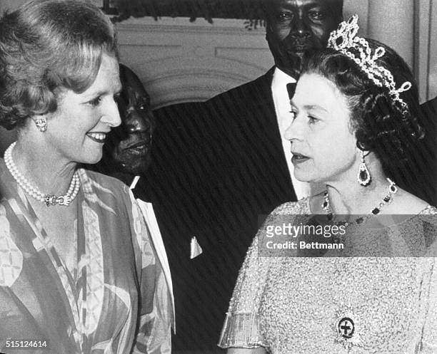 Lusaka, Zambia- British Prime Minister, Margaret Thatcher, and Queen Elizabeth, chat at a party for the Heads of State gathered here for the...