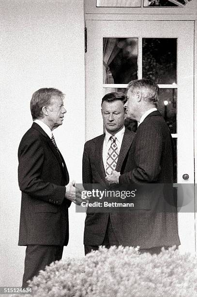 Washington, DC- President Jimmy Carter talks with top foreign advisors, National Security Advisor Zbigniew Bzezinski and Secretary of State Cyrus...