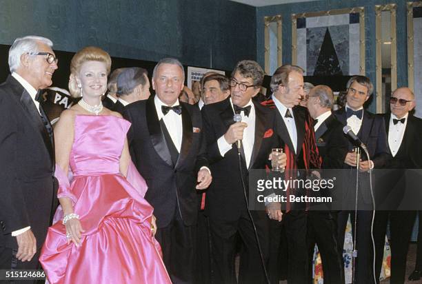Attending Frank Sinatra's Pied Piper Award ceremony are Cary Grant, Barbara and Frank Sinatra, Dean Martin, Harry James and Rich Little.