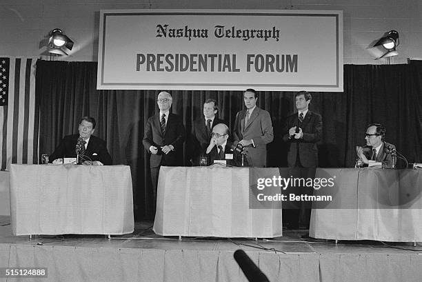 Nashua, N.H.: GOP hopeful Ronald Reagan escorts candidates Rep. John Anderson, Sen. Bob Dole and Sen. Howard Baker from the stage after they were...