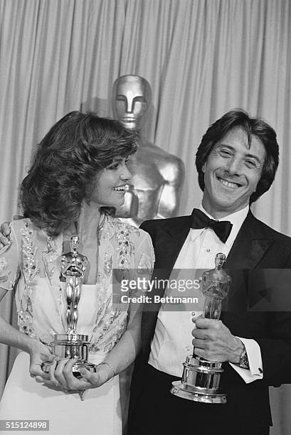 Actress Sally Field and actor Dustin Hoffman smile happily after they won the best actor and best actress award at the 52nd Annual Academy Awards...