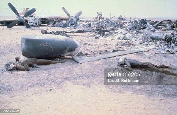 Robat-E-Posht-E Badam, Iran: Charred bodies and wreckage of a C-130 and helicopters lies in the desert this oasis following the failure of the...