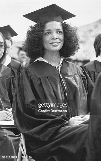 Amherst, Massachusetts: Camille Cosby, wife of entertainer, Billy Cosby, listens to commencement proceedings today at Alumni Stadium at the Amherst...