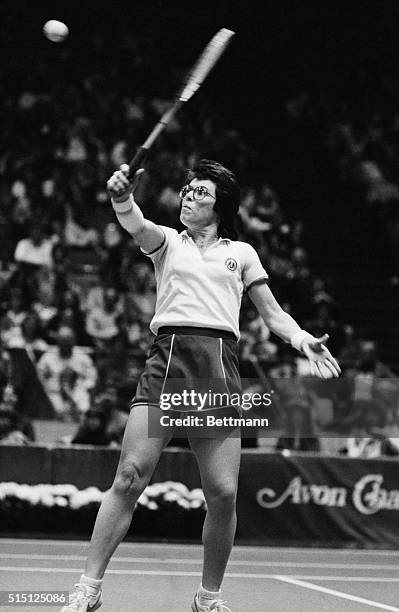 Billie Jean King returns a high backhand shot in upsetting top rated Martina Navratilova in two straight sets to win the $30,000 top prize in the...