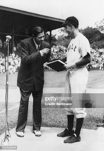 New Haven, CT- George Bush welcomes Babe Ruth at a pre-game ceremony in 1948 at the Yale University field. Bush, captain of the 1948 varsity baseball...