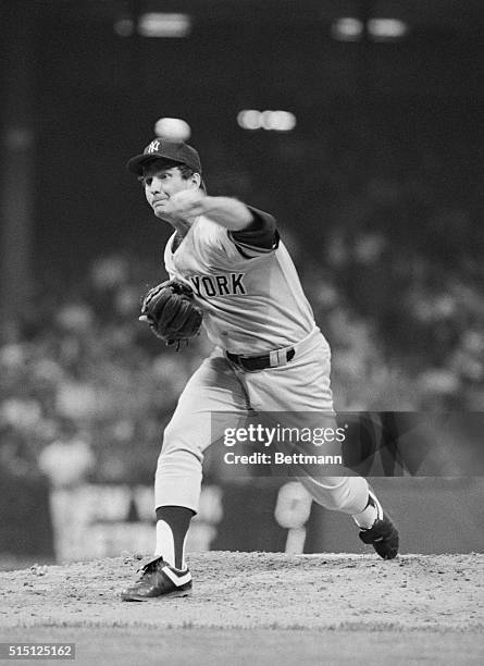 Yankees--Tigers. Detroit: New York Yankees' Tommy John tosses the ball during the New York-Detroit game, May 20, as he goes after his 200th major...