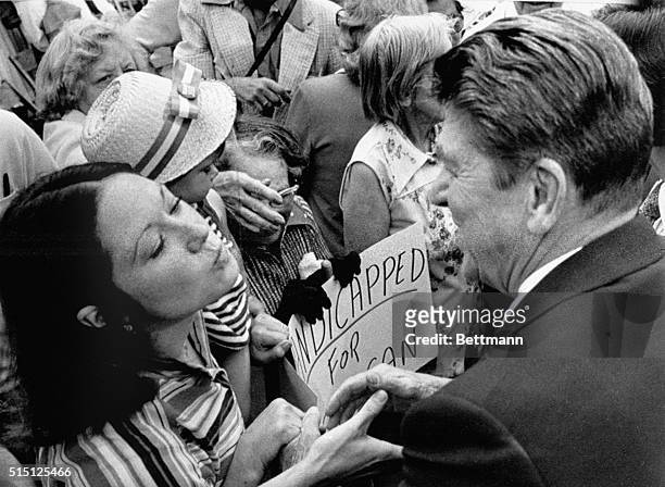 Cincinnati: A supporter of Republican presidential hopeful Ronald Reagan puckers up in hopes of getting a kiss from the former governor as he shakes...