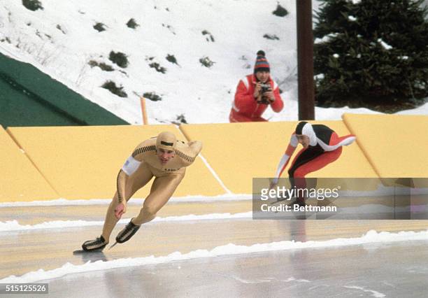 America's Eric Heiden, leads Canada's Gaetan Boucher in the 1000 meter speedkating competition at the 1980 Olympics. Heiden won the gold medal, while...