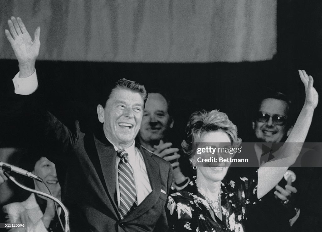 Ronald and Nancy Reagan Waving to Crowd