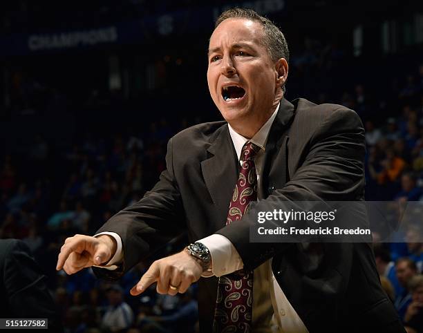 Head coach Billy Kennedy of the Texas A&M Aggies coaches during the second half of and SEC Basketball Tournament Semifinal game at Bridgestone Arena...