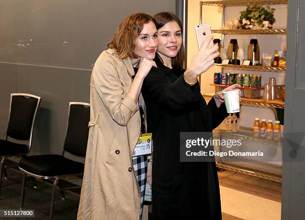 Katherine Power, co-founder and CEO of Clique Media Group and Emily Weiss, founder and CEO of Glossier take a selfie at "Self Sells: How Glossier is...