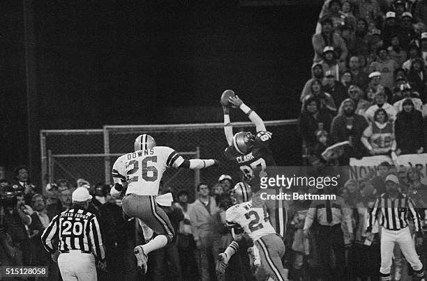 San Francisco 49ers Dwight Clark , goes up in the air in the end zone for the game-tying touchdown pass from Qb Joe Montana to set up the PAT which...