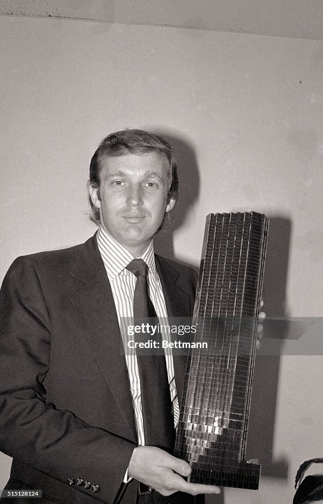 Donald Trump Holding Model of Tower