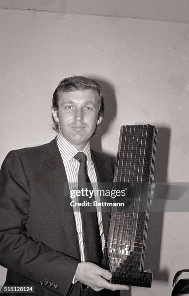 Donald Trump Holding Model of Tower Donald Trump Holding Model of Tower