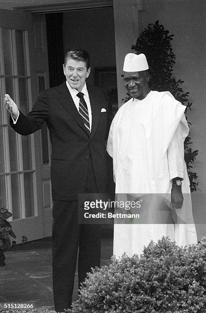 Washington: President Reagan greets Guinea President Sekou Toure at the White House prior to a meeting in the Oval Office.