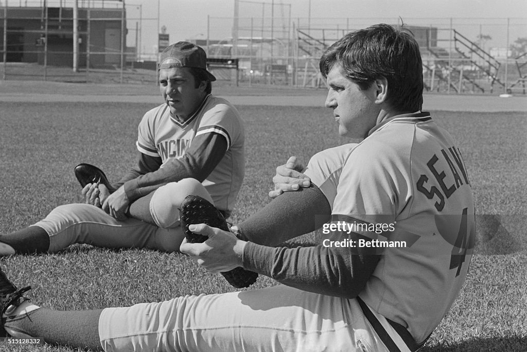 Tom Seaver and Johnny Bench Sitting on Grass and Exercising