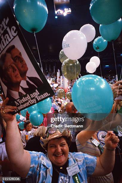 Florida delegate Dolores A. Knight enjoys President Carter's renomination 8/13 at Madison Square Garden on the third day of the Democratic National...