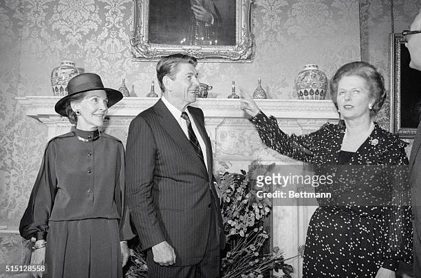 London, England: President Ronald Reagan and wife Nancy meet with British prime minister Margaret Thatcher today inside No. 10 Downing Street,...