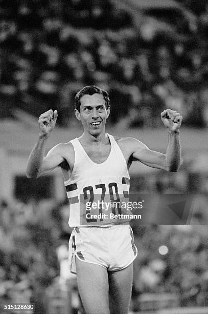 Britain's Steve Ovett clenches his fists in jubilation after winning his heat of the men's 1500-meters semi-finals at Lenin Stadium 7/31. Ovett will...
