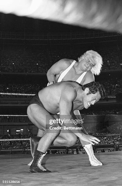 Japanese wrestler Antonio Inoki gets himself into a little bit of arm trouble at the hands of Larry "Pretty Boy" Sharpe during their match at Shea...