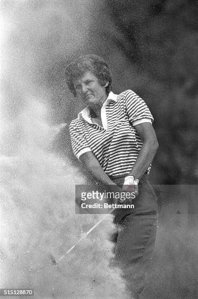 Hilton Head, South Carolina: Second round women's international leader Kathy Whitworth is engulfed in a cloud of sand as she blasts her way out of a...