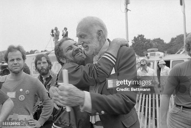 New York: Abbie Hoffman hugs Dr. Benjamin Spock at the peace rally in Central Park June 12. Their protests date back to the Vietnam War.