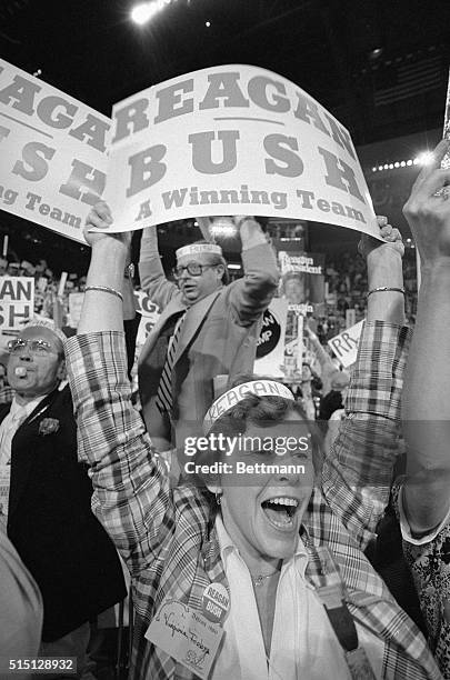 Demonstrators at the Republican National Convention 7/16 whoop it up on the floor of Joe Louis Arena in favor of their man, George Bush, for Vice...