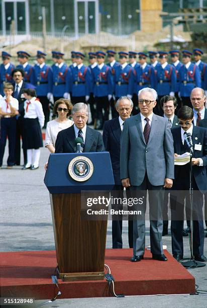 Belgrade, Yugoslavia: US president Jimmy Carter and Yugoslav president of the Presidency, Cvijetin Mijatovic , walk from airplane just after Carter's...