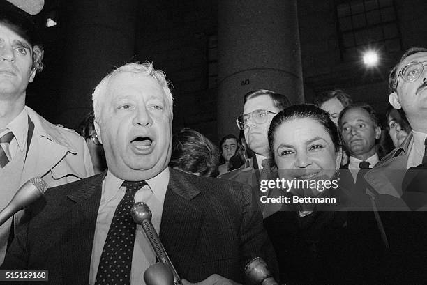 New York: Israeli Gen. Ariel Sharon and wife, Lilly briefly talk to press outside U.S. District Court where the Federal Jury began considering the...