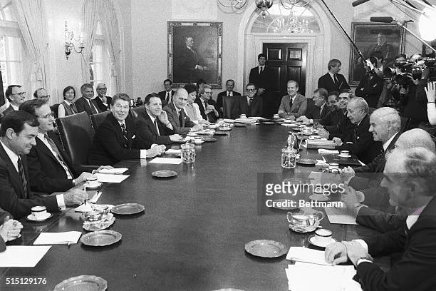 President Reagan meets with his Cabinet 11/13 at the White House. Clockwise around the table are: Interior Secretary William Clark; Vice President...