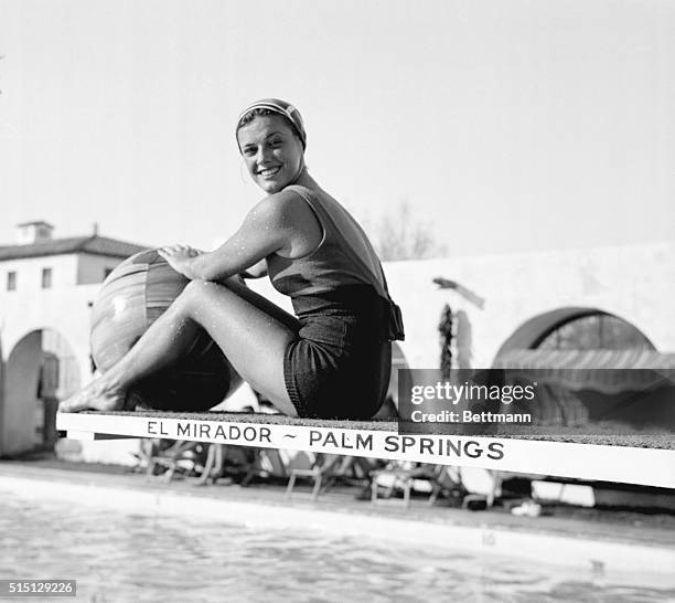 Enjoying California's Warm Christmas Sun. Palm Spring, California: Eleanor Holm seated on the springboard of the pool at El Mirador Hotel, Palm...