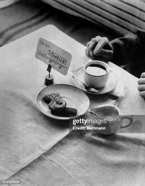 In some of the towns in Southern Germany, restaurant owners place placards on tables for arriving foreigners, so that they will not be disturbed by...