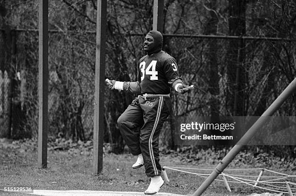 Lake Forest, Ill.: Star running back Walter Payton jumps rope during workout at the Bears' training camp 12/5. Payton was being considered as a...