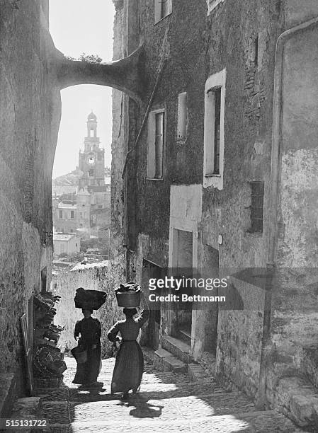 Light and Shadows of Old Italy. San Remo, Italy: Here is an interesting photographic study, a typical narrow street in the old quarters of San Remo,...