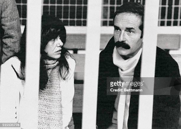 Former Red Brigades terrorists Adriana Faranda and Valerio Morucci, are shown behind steel bars in a Rome courtroom here, during an appeal trial...