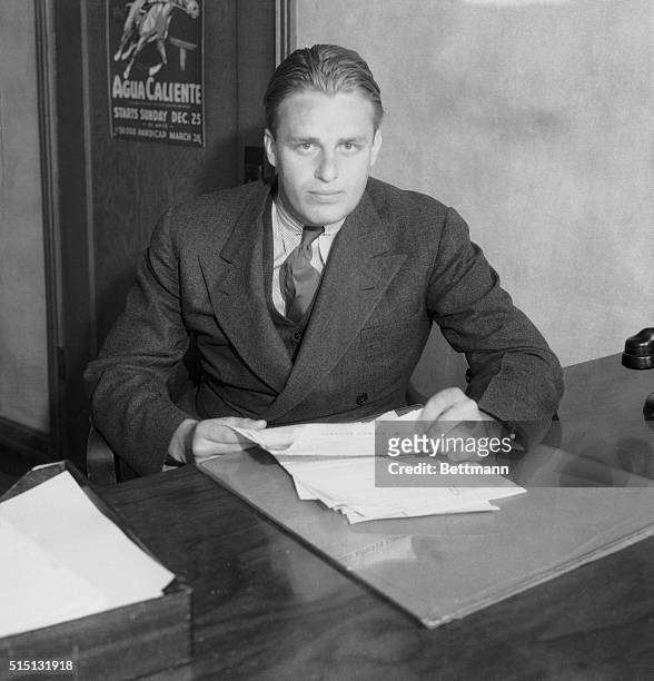 Glendale, California: President's Son An Airline Official. Elliot Roosevelt, son of the President, shown at his desk in the Gilpin Air Lines at...
