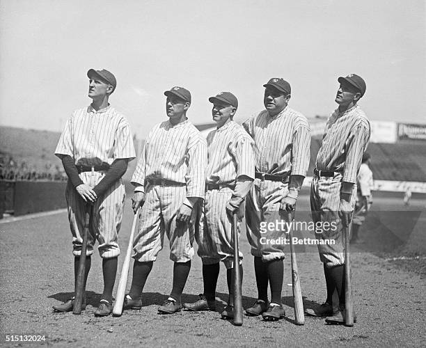 Left to right in photo are shown Herbie Pennock, star Southpaw; Wallie Schang, first string and heavy hitting catcher; Whitey Witt, the speedy...