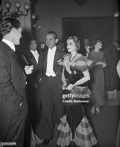 Prince and Princess Alexis Mdivani shown arriving at the Metropolitan Opera House, New York, December 26th, for the opening of the opera season....