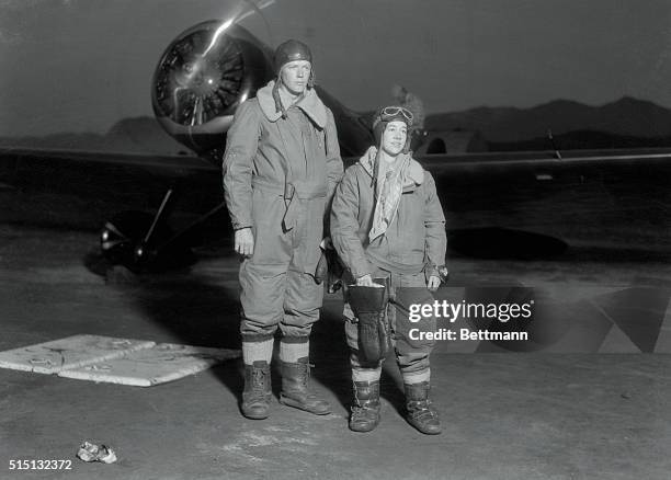 Photo shows Colonel Charles Lindbergh and his wife, the former Anne Morrow, at Glendale, California, at the start of his record breaking...