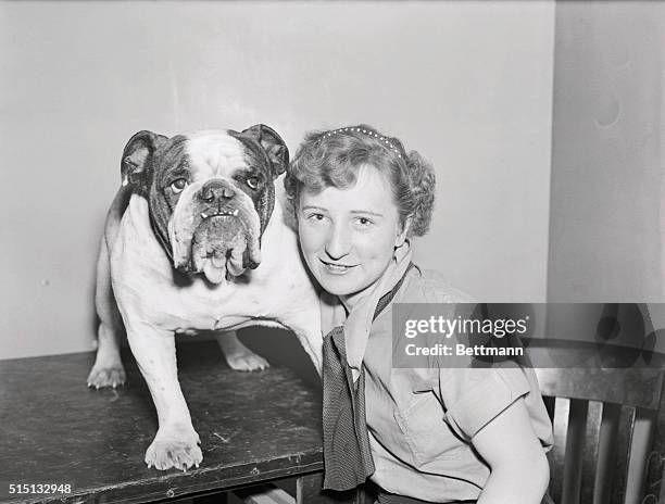 Nan Hayden, pictured with the musically-named "Drink-Moor Moonshine" declared the best English bulldog at the 59th annual dog show of the Westminster...