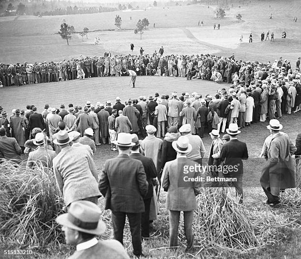 At Masters' invitation golf tourney. Bobby Jones missing a putt on the 16th green during the second round of the Masters' Invitation Golf Tournament...