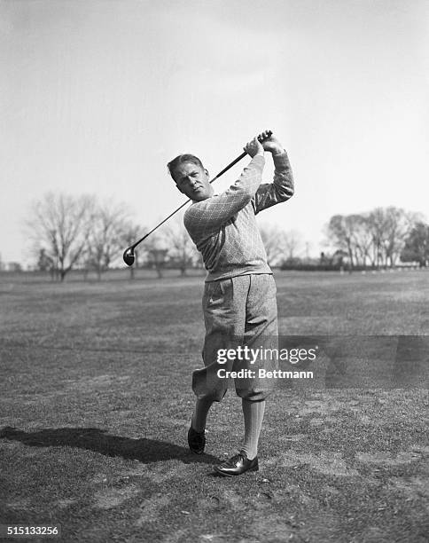 Ending a four-year absence from golf, Bobby Jones is pictured here on his return to the Masters Invitation Golf Tournament at the Augusta Golf Club...