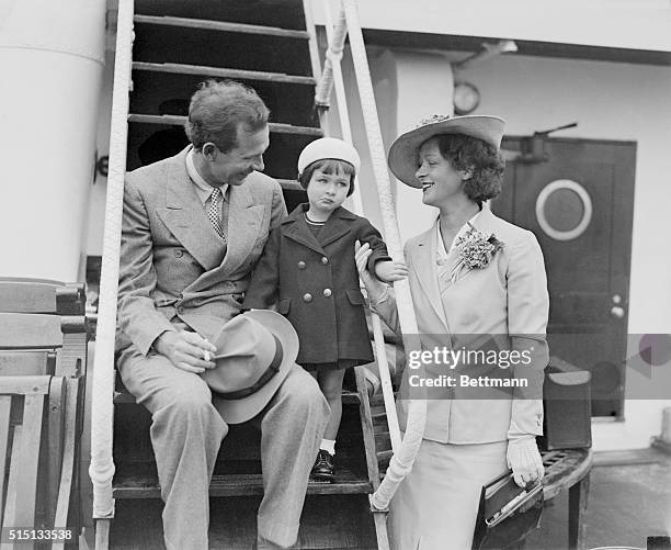 Nunnally Johnson, prominent humorist, short story writer, newspaper columnist and now a screenwriter, is pictured with his wife and daughter, Nora as...