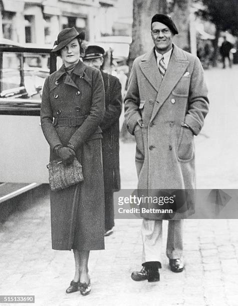 Mrs. James H.R. Cromwell, the former Doris Duke, heiress to the Duke tobacco millions, and her husband, shown at Cannes, France, as they left on a...