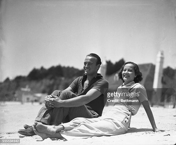 Merle Oberon, British screen favorite, is pictured above with David Niven, ex-lieutenant in the Scottish Highland Infantry, and son of the late Lady...
